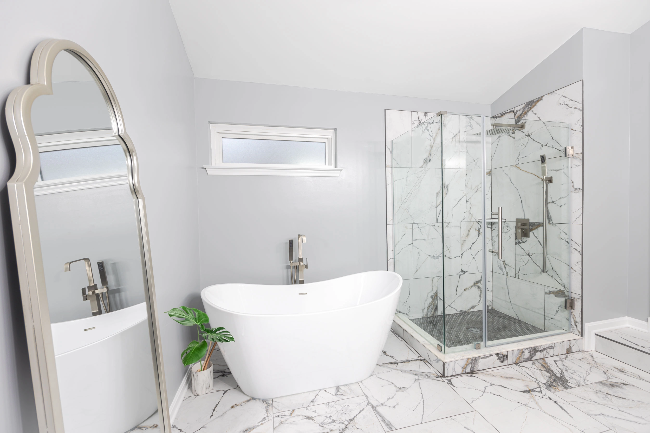 A team of Zion Home Remodeling professionals efficiently working together to expedite a bathroom renovation project, emphasizing their commitment to timely and seamless service.