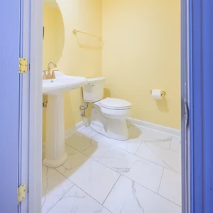 Professional toilet installation in Prince George’s, Montgomery, Charles, Anne Arundel, Calvert, and Howard Counties, Maryland, showing a completed bathroom setup with secure plumbing, new supply line, and wax ring replacement by our licensed team.